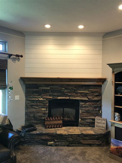 fireplace with shiplap above|More.